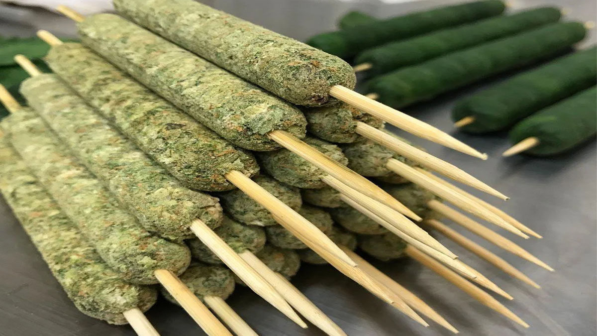 Thai sticks with pressed bud and concentrates on a table