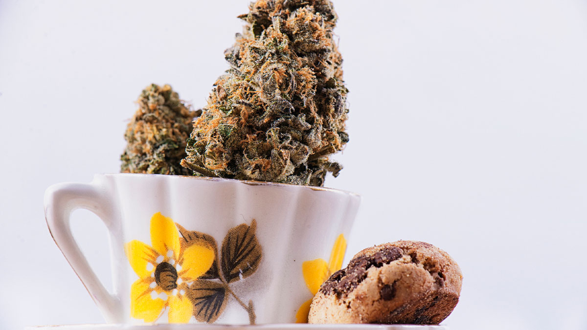Weed bud with coffee and cookie showing wake and bake