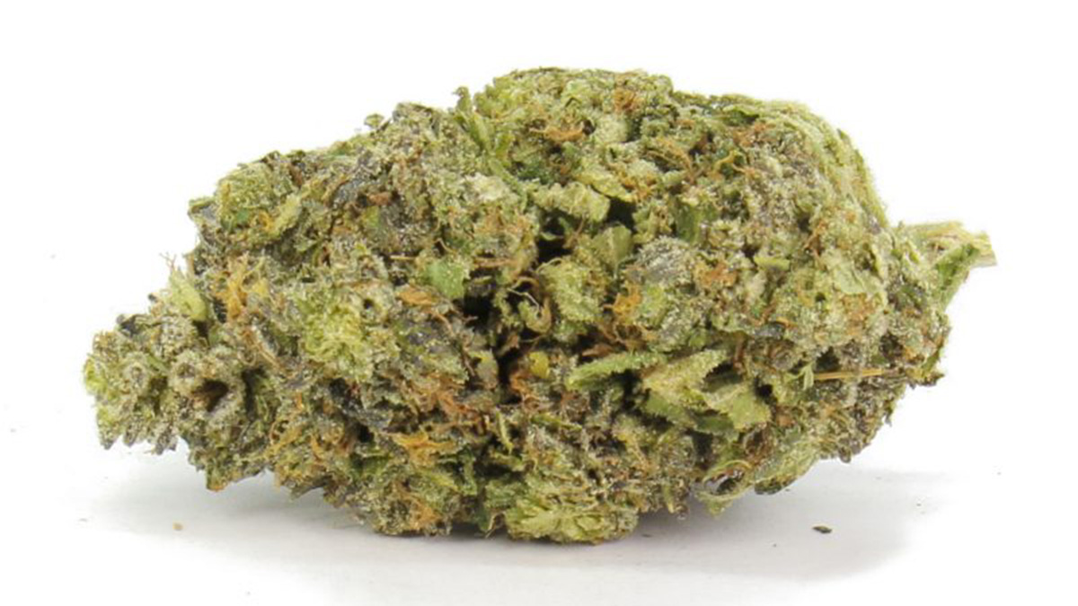 Close up of the Strawberry Cough strain in white background.